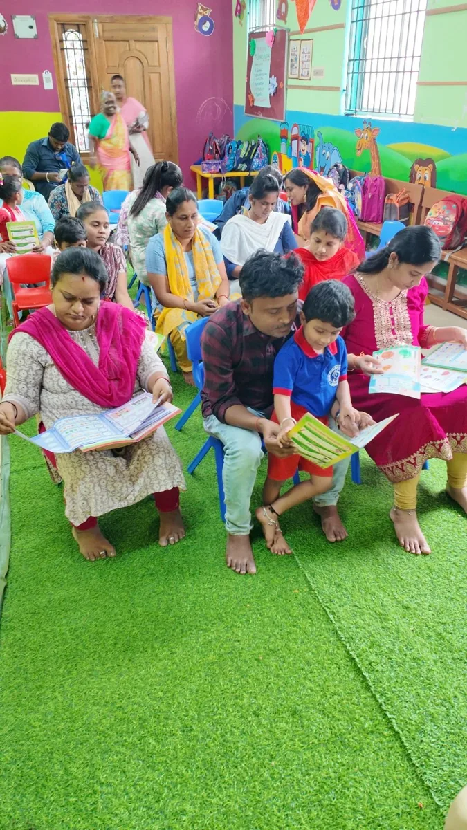 Parents and children reading together